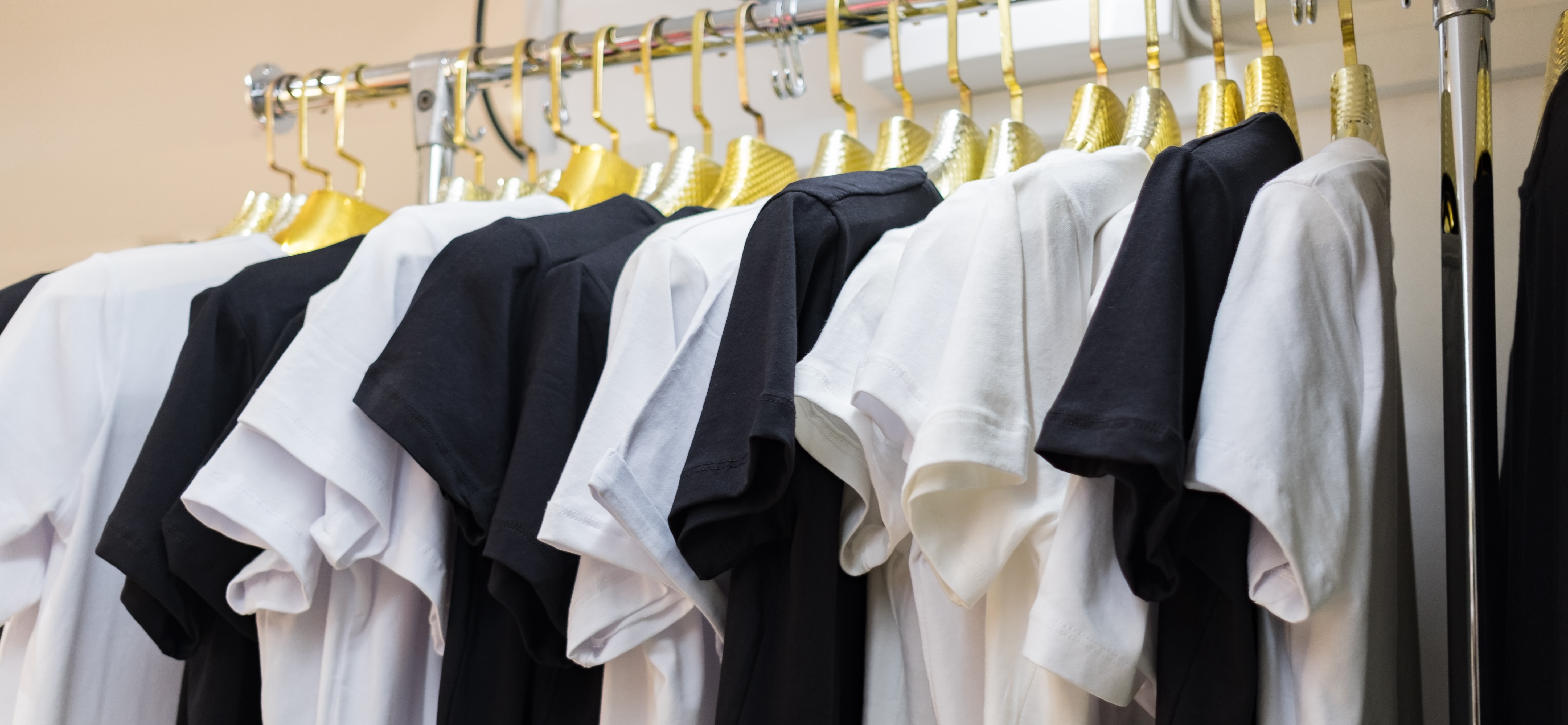 Clothing rack full of stylish clothes